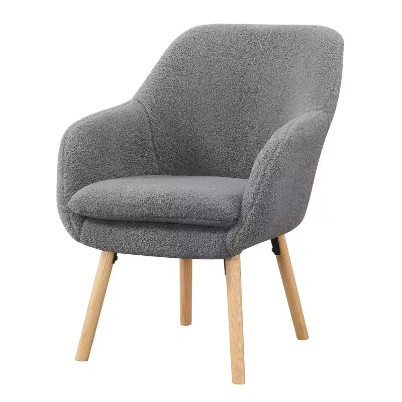 Poltroncina con braccioli Charlotte Wingback in simil montone con struttura in legno di gomma naturale